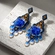 Brinco artesanal flor azul royal com cristais e miçangas